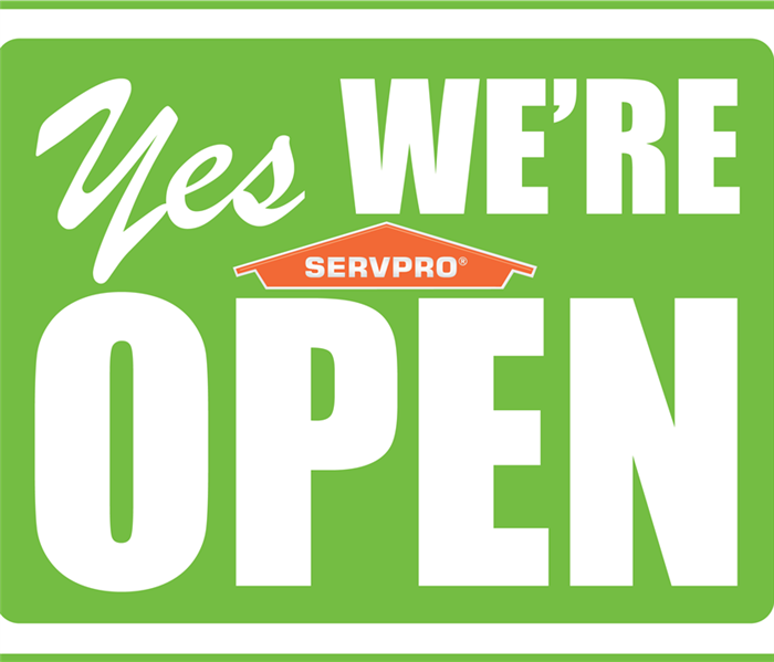"Yes We Are Open" with SERVPRO logo